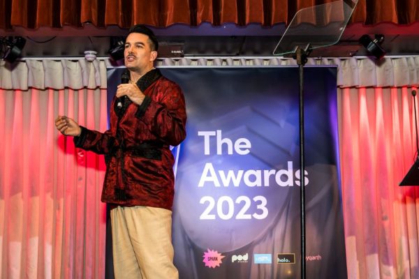 man presenting at IPM Awards night