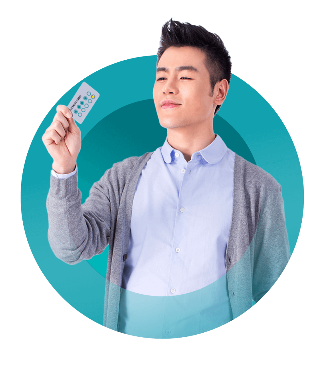 Man holding a loyalty promotion card