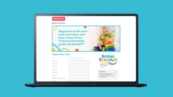 a laptop with the Fisher Price Instant Win Registration Form for Promotion