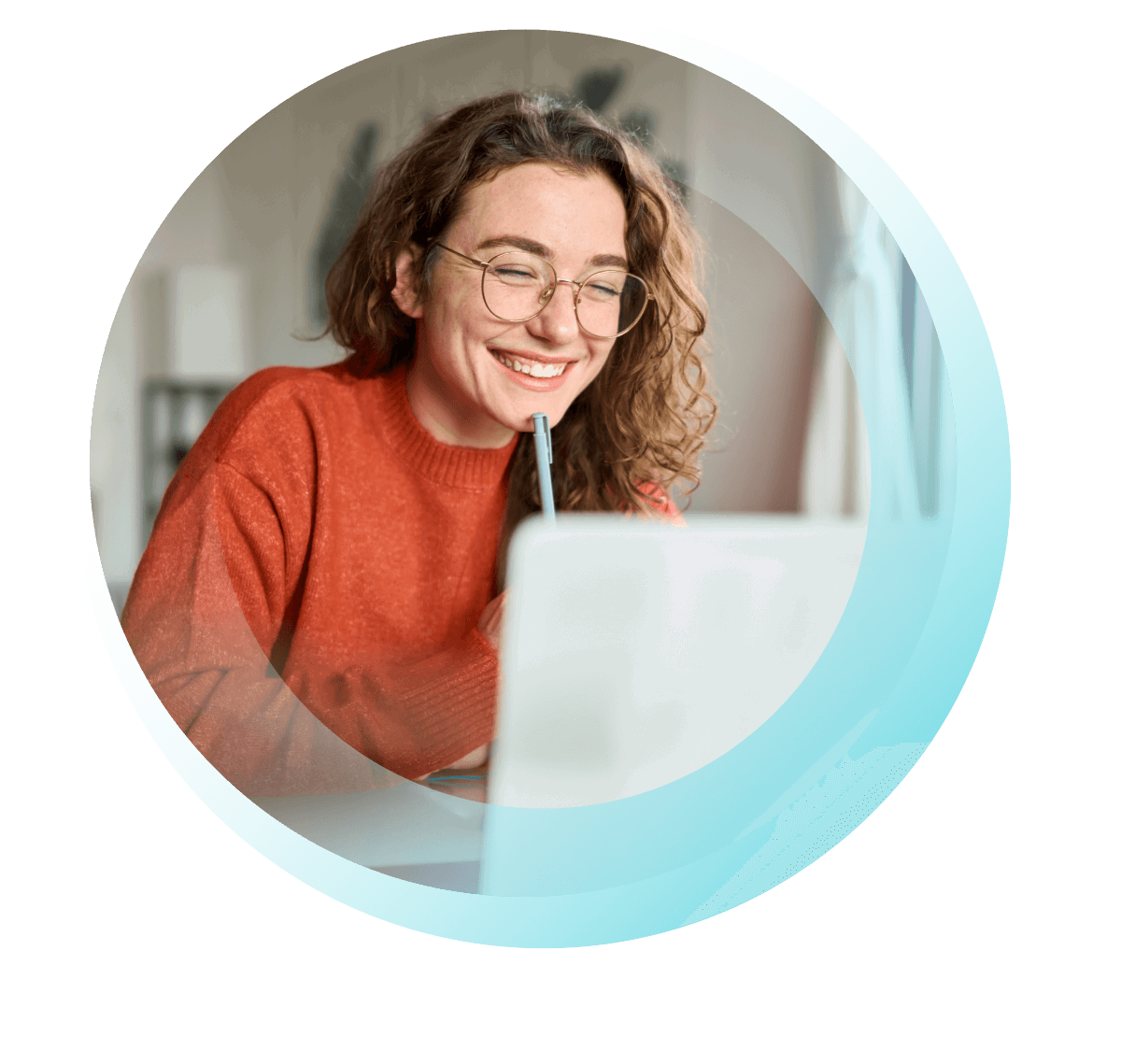 Woman with glasses smiling at her laptop